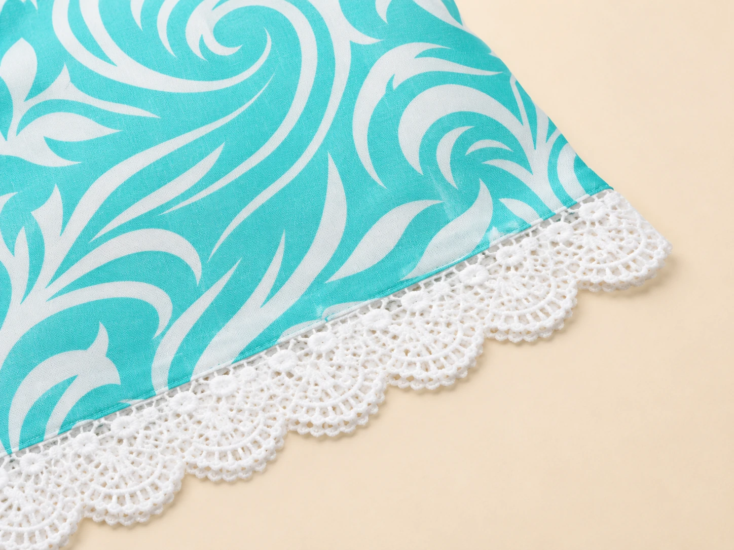 White crochet lace trim detail