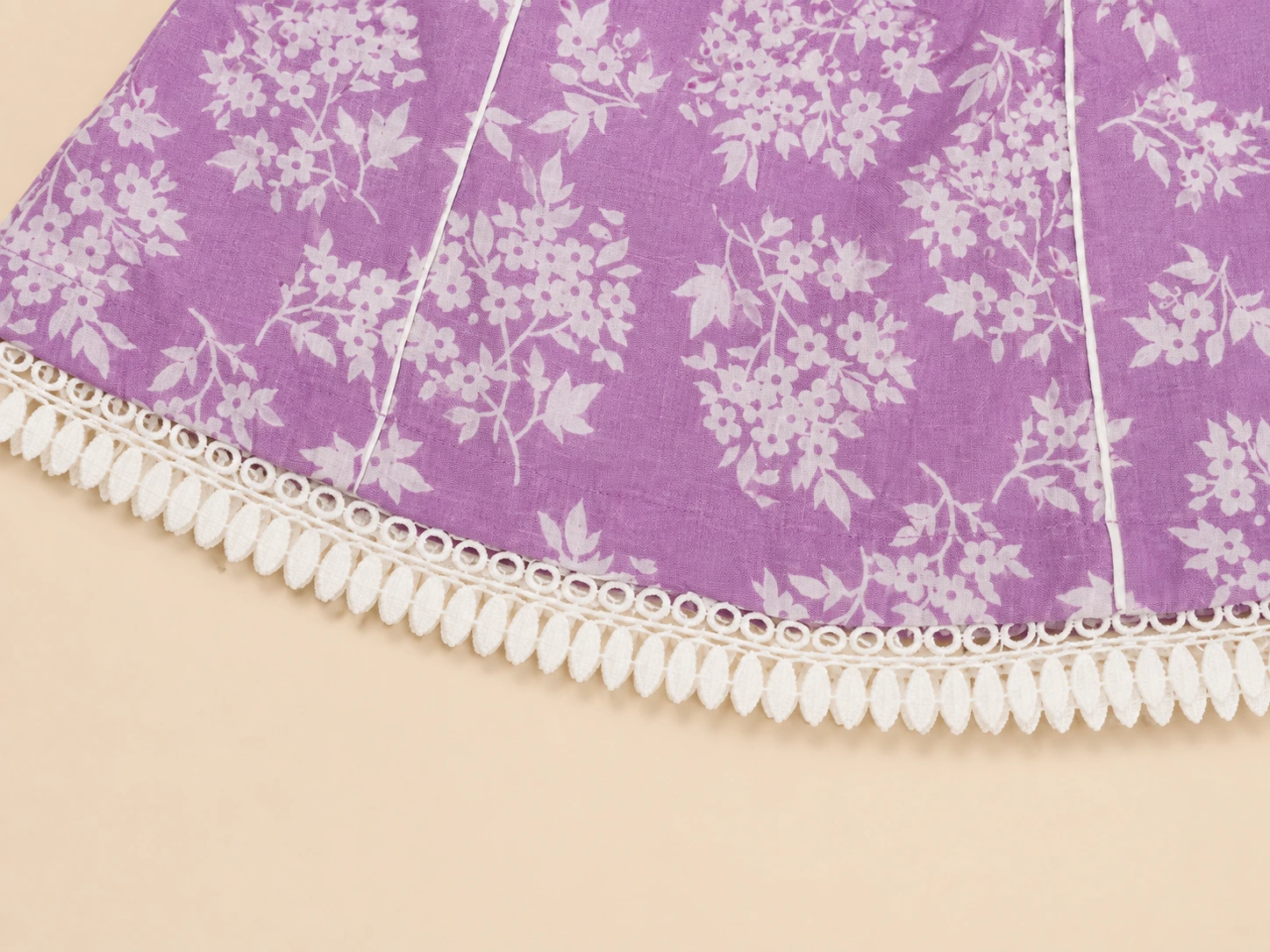 White pom-pom lace trim detail