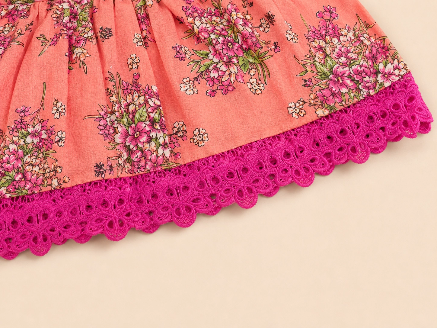 Magenta eyelet lace trim detail