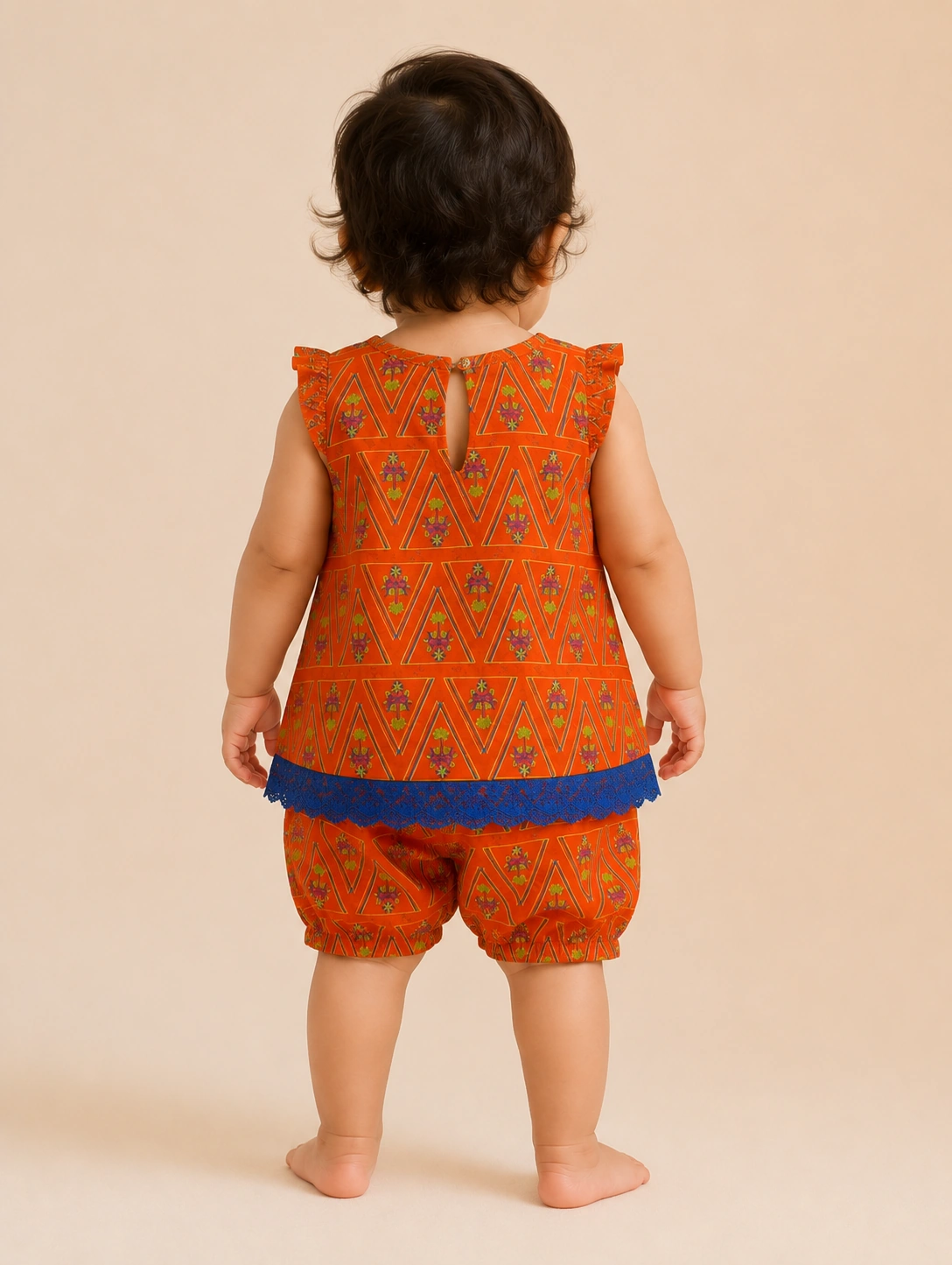 Tangerine Aztec back view with blue crochet lace