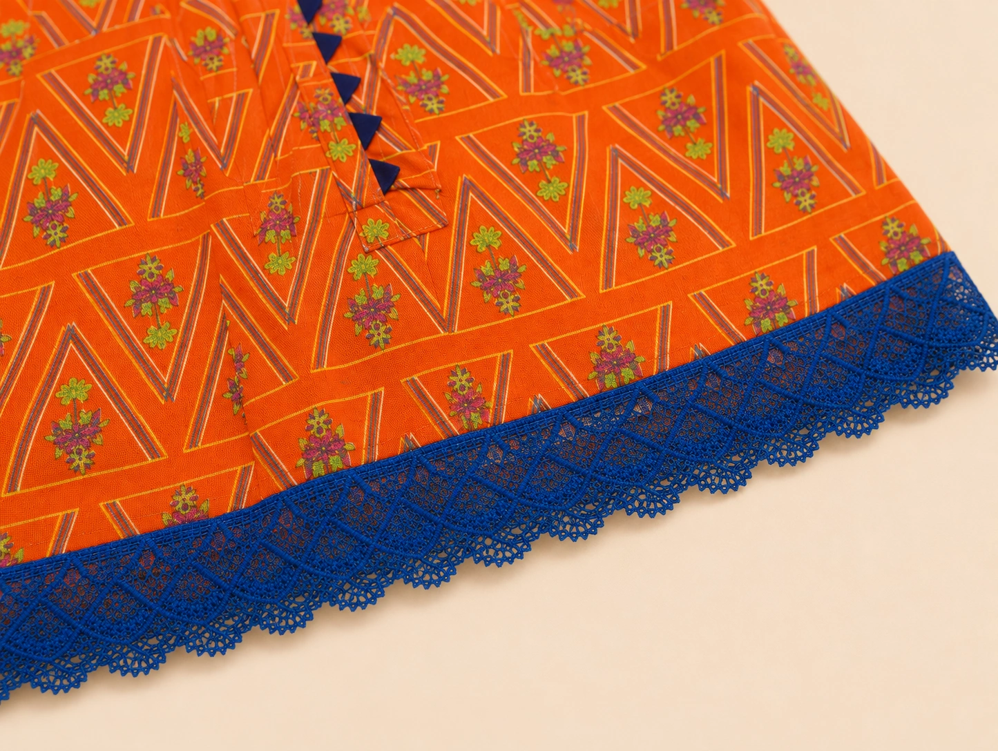 Close-up of navy placket and blue lace